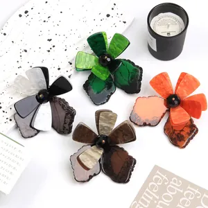 Exquisite acrylic floral brooches in four colors with elegant marble texture accents
