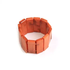Elastic acrylic bracelet with orange marble texture rectangular beads in a wide design