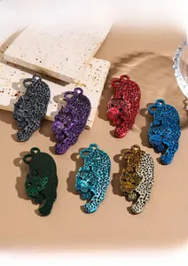 Detailed showcase of leopard acrylic brooches in seven vibrant colors with embossed texture