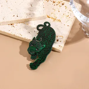 Luxe leopard panther brooch pendant in emerald green and black enamel jewelry