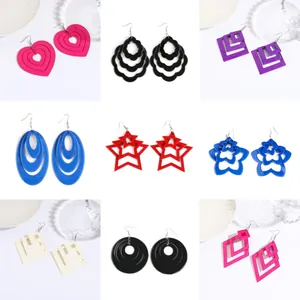 Collection of nine colorful acrylic dangle earrings in geometric heart and star shapes