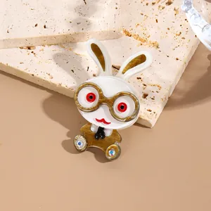 Minimalist acrylic cartoon rabbit brooch with gold marble texture and crystal details