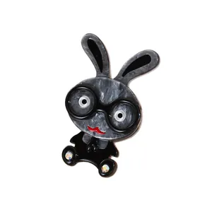 Cartoon rabbit acrylic brooch with marble texture and sparkling rhinestone details