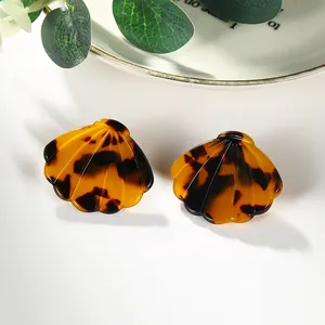 Vintage acrylic leopard print shell earrings in tortoiseshell pattern for beach vacations