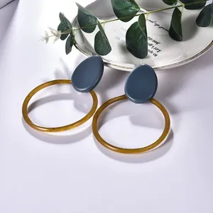 Retro geometric acetate acrylic drop earrings with blue studs and amber resin rings