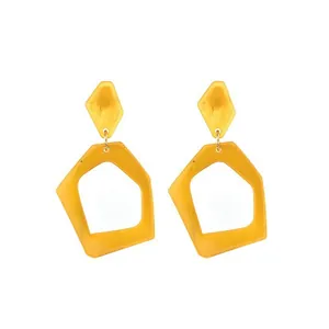 Bright yellow geometric resin drop earrings with hollow pentagon and rhombus design