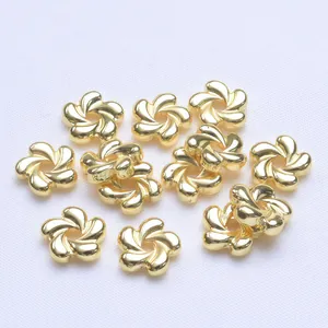 Detailed view of 14k gold-plated 5-petal flower spacer beads for DIY jewelry making