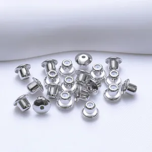 Close-up of polished 5mm ball earring backs with secure silicone core inserts