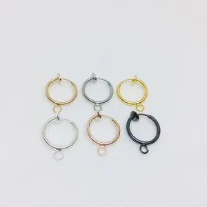 Macro shot of six metallic spring ear clips in diverse colors for DIY earring making