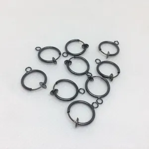 Detailed view of gunmetal 13mm spring clip-on earring converters for non-pierced DIY jewelry