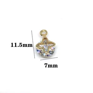 Macro view of 11.5x7mm gold heart pendant with zircon inlay for jewelry making