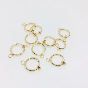 Detailed close-up of 13mm gold plated spring ear clips with hanging loop for DIY jewelry