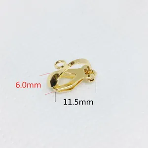 Macro detail of 11.5mm golden triangle ear clips with dimensions for jewelry making
