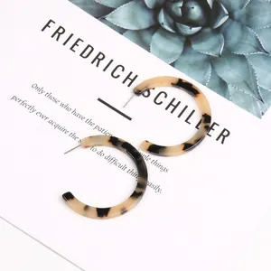 Vintage tortoiseshell C-shape acrylic hoop earring with leopard pattern and silver post
