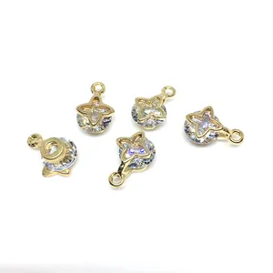 Set of 5 golden starburst charms with brilliant round-cut clear zircons for DIY jewelry