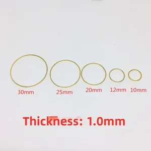 Detailed view of 14k gold plated brass circles in five sizes from 10mm to 30mm diameter