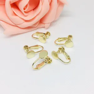 Macro shot of 5 screw-adjustable gold-plated earring clip converters for DIY jewelry making