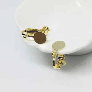 Pair of gold plated screw-back ear clip converters with flat pads for DIY earring making