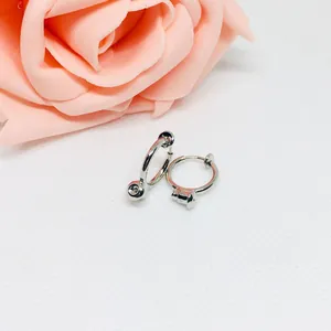 Silver spring clip-on earring converters for non-pierced ears with flower decor