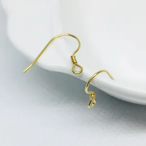 Macro view of 18k gold plated S925 sterling silver ear hooks with spring detail