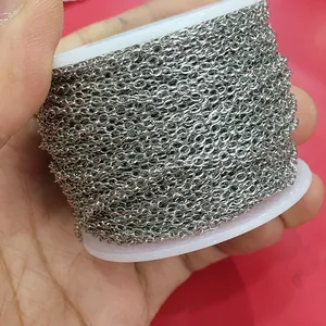 Close-up of bulk silver cable chain roll for DIY jewelry making and necklaces