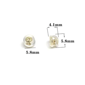 Detailed view of 5.8mm x 4.1mm silicone earring backs with 18k gold-plated core