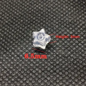 Macro shot of 5mm star-shaped silicone earring backs for DIY jewelry making