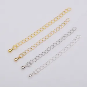 Detailed view of 14K gold and silver water drop extender chains for jewelry making