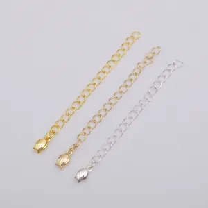 Detailed view of tulip pendant extension chains in gold, rose gold, and silver finishes