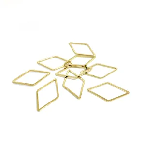 Macro shot of 14k gold-filled hollow rhombus charms for DIY handmade earring accessories