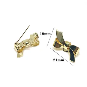 Broche nœud 3D plaqué or 18 carats avec petit anneau de suspension taille 21x19mm