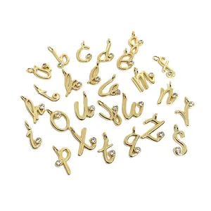 Set of 26 gold lowercase alphabet charms with micro-paved cubic zirconia for DIY jewelry