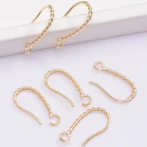 Detailed view of 14K gold plated twisted ear hooks for DIY handmade jewelry crafts