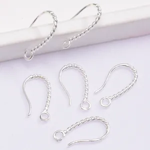 Detailed macro view of 14K gold plated silver twist earring hooks for DIY jewelry making