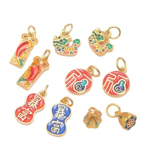 Traditional Chinese style gold plated charm set with dragon, lotus and fortune motifs