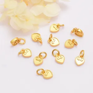 Golden heart coin pendants with traditional cloud pattern for DIY jewelry making