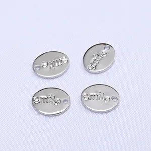 Set of four 14k gold-plated oval smile pendants for DIY jewelry making and beadwork