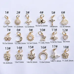 Sélection de breloques dorées 14 carats avec zircons en formes de cœur étoile et papillon