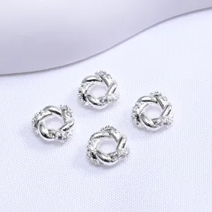Set de 4 cuentas espaciadoras de corona bañadas en plata de 18K con circonitas