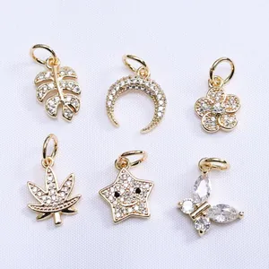 Détail macro de pendentifs plaqués or 14k avec zircone pour la création de bijoux