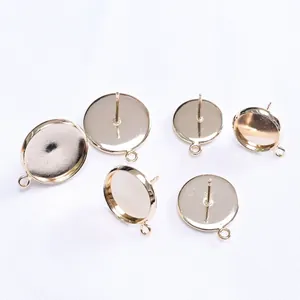 Close-up of 14k gold plated earring studs with 10mm tray and hanging loops for DIY