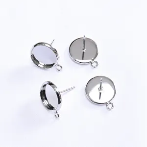 Polished 14k gold-filled round stud earring settings with hanging loops for DIY jewelry