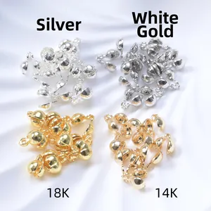 Close-up of 14K and 18K gold-plated jewelry clasp connectors in four metallic finishes