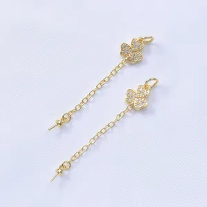 Detail of 18K gold-plated clover charms with micro-pave zircons for DIY jewelry making