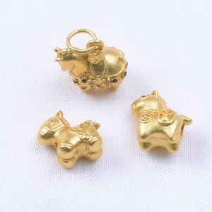 Three gold zodiac horse pendants with matte finish and zircons for DIY jewelry making