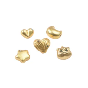 Golden sand gold zodiac beads with heart, star, and cat shapes for DIY jewelry making