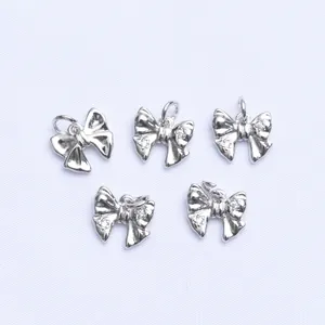 Lot de 5 pendentifs nœuds plaqués argent 18K avec zircone pour création de bijoux DIY