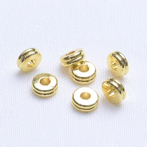Perle distanziatrici tonde piatte in oro 14k con scanalature laterali per gioielli DIY