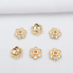 Close-up of 14K gold plated flower bead caps with micro-set zircon for DIY jewelry