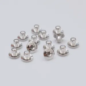 Detailed view of polished 14k gold-plated bullet-style earring backs with silicone cores
